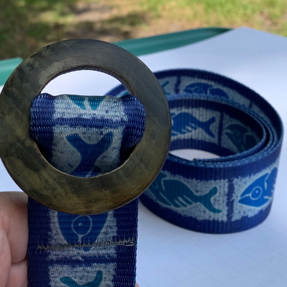 Croakies colorful belt with blue fish. Unisex.